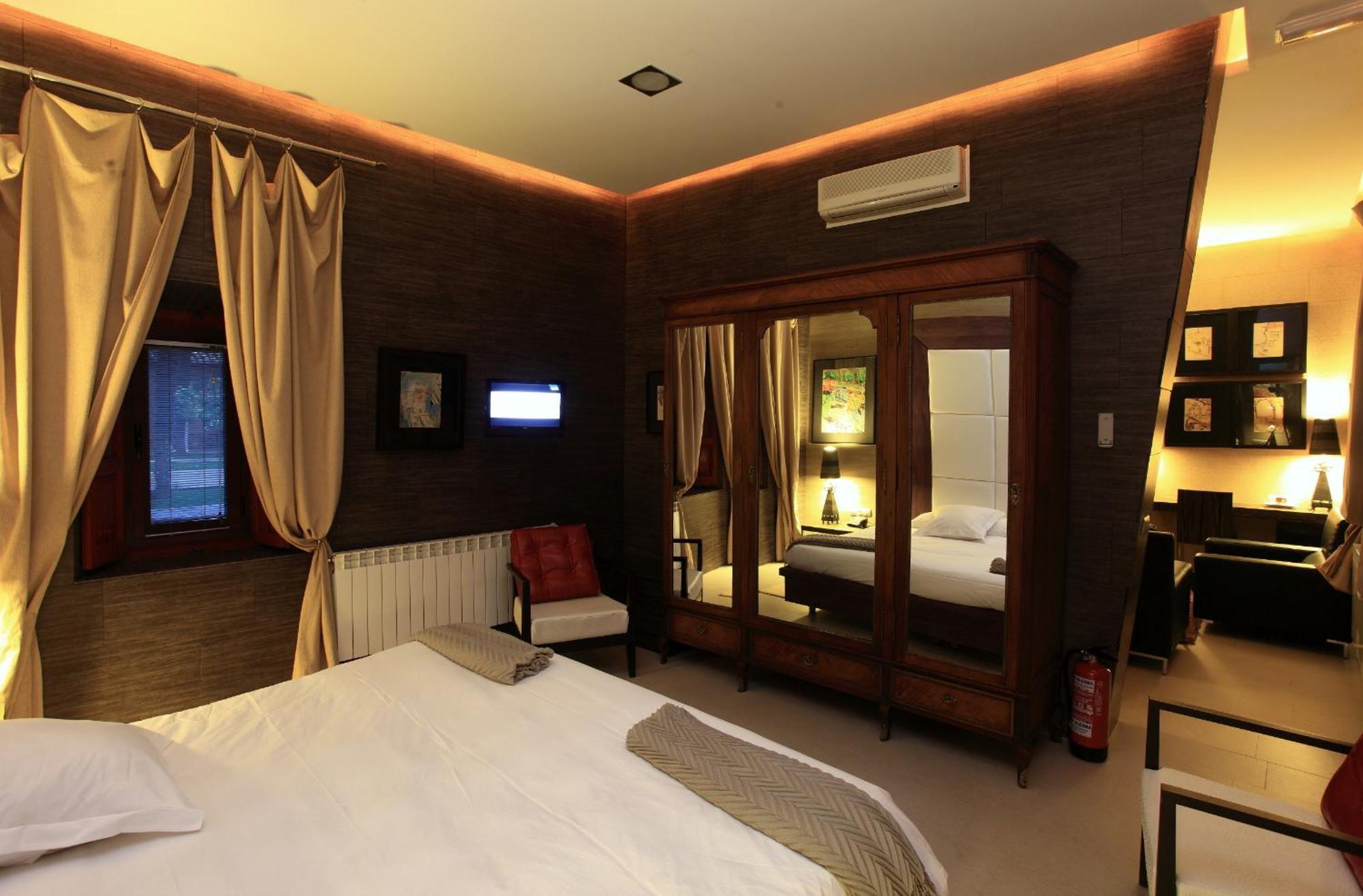 Hotel Boutique Palacio De La Serna Ballesteros De Calatrava Rum bild